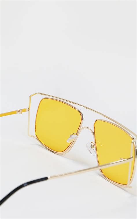 oversized yellow sunglasses.